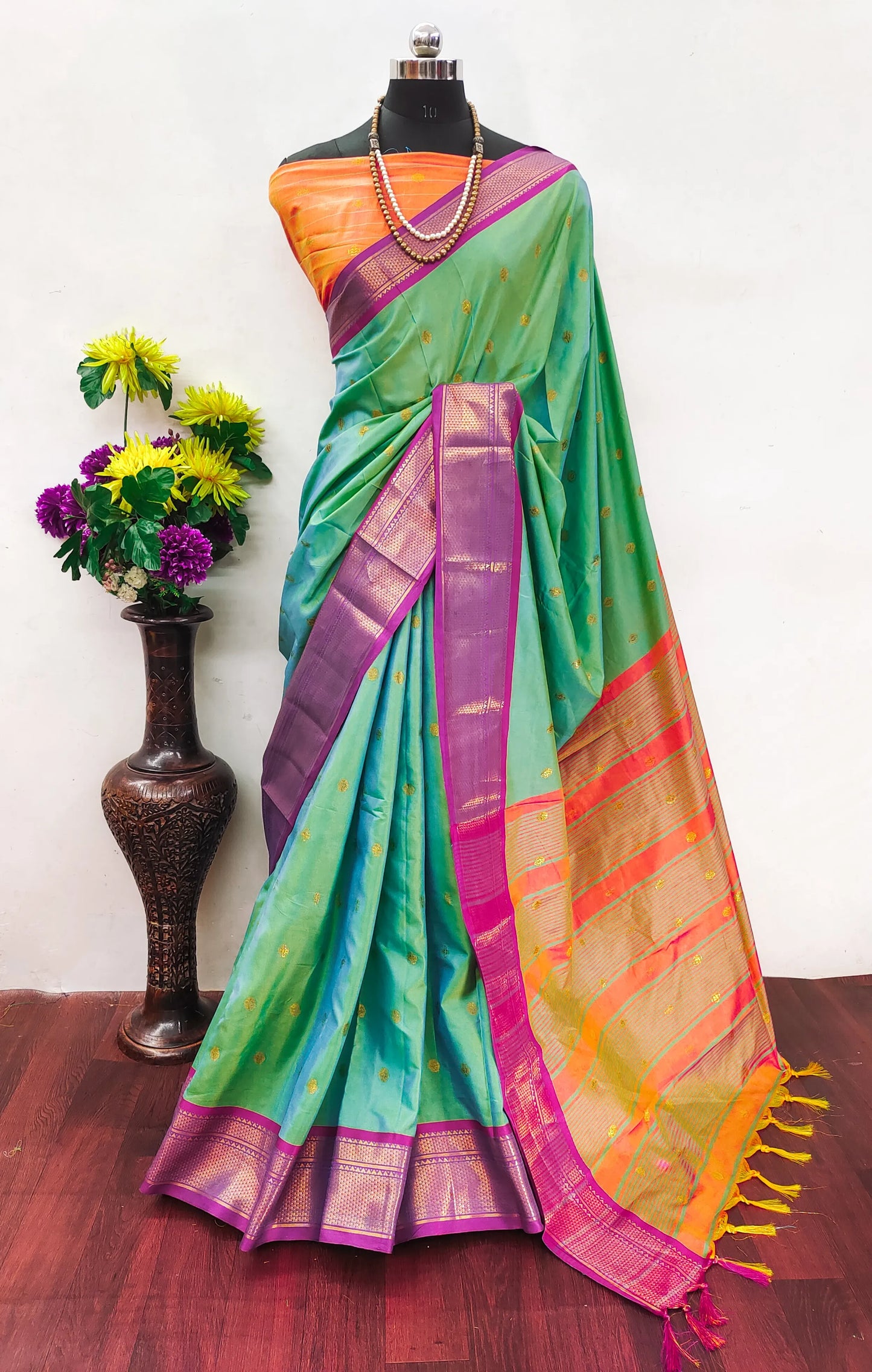 Mint Green Cotton Silk Saree with Gold Butti & Magenta Zari Border