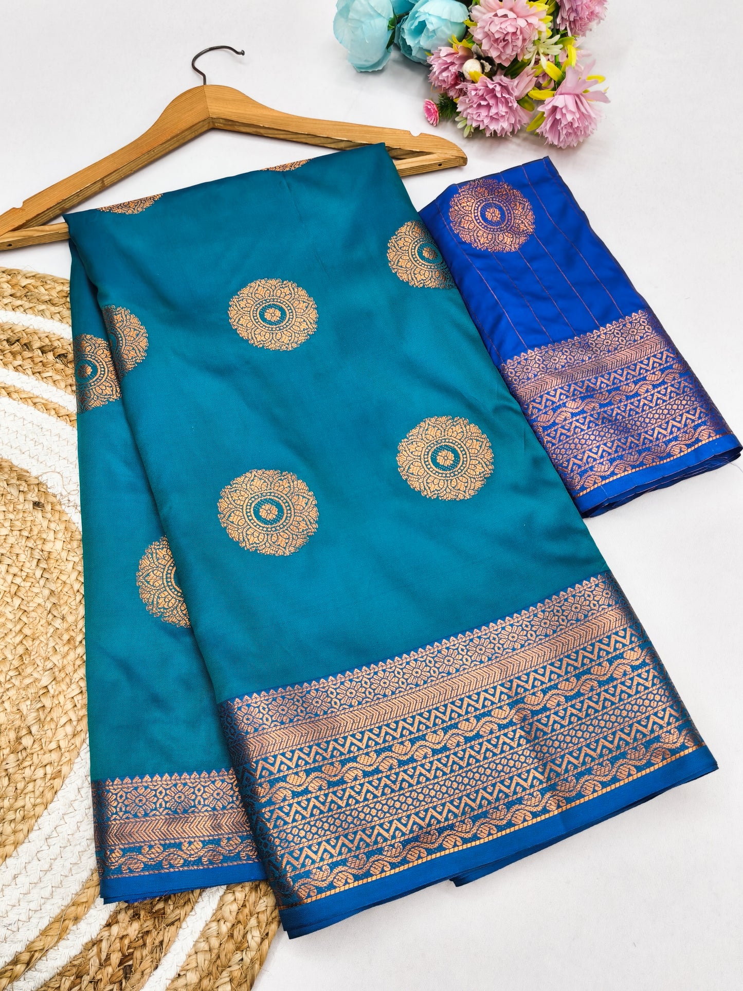 Firozi Blue Soft Silk Saree with Royal Blue Zari Border & Circular Floral Medallion Motifs