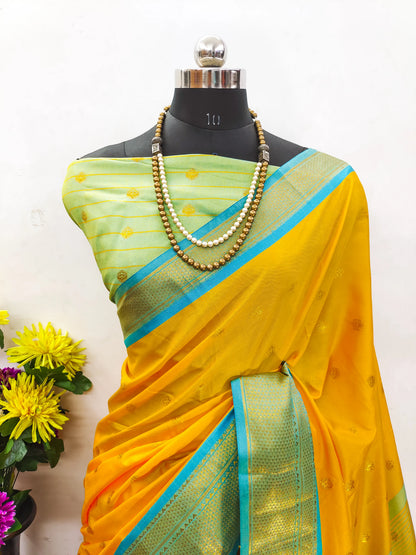 Bright Marigold Yellow Cotton Silk Saree with Aqua Blue Zari Border & Mint Green Contrast Blouse