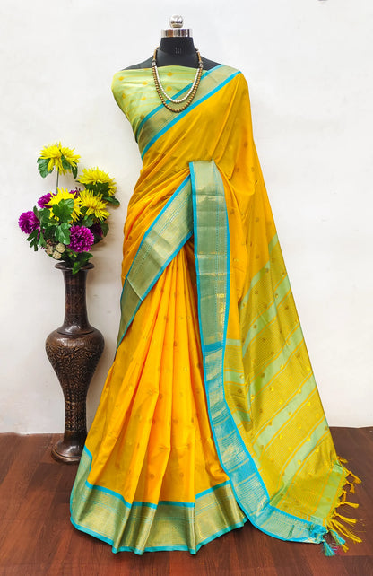Bright Marigold Yellow Cotton Silk Saree with Aqua Blue Zari Border & Mint Green Contrast Blouse