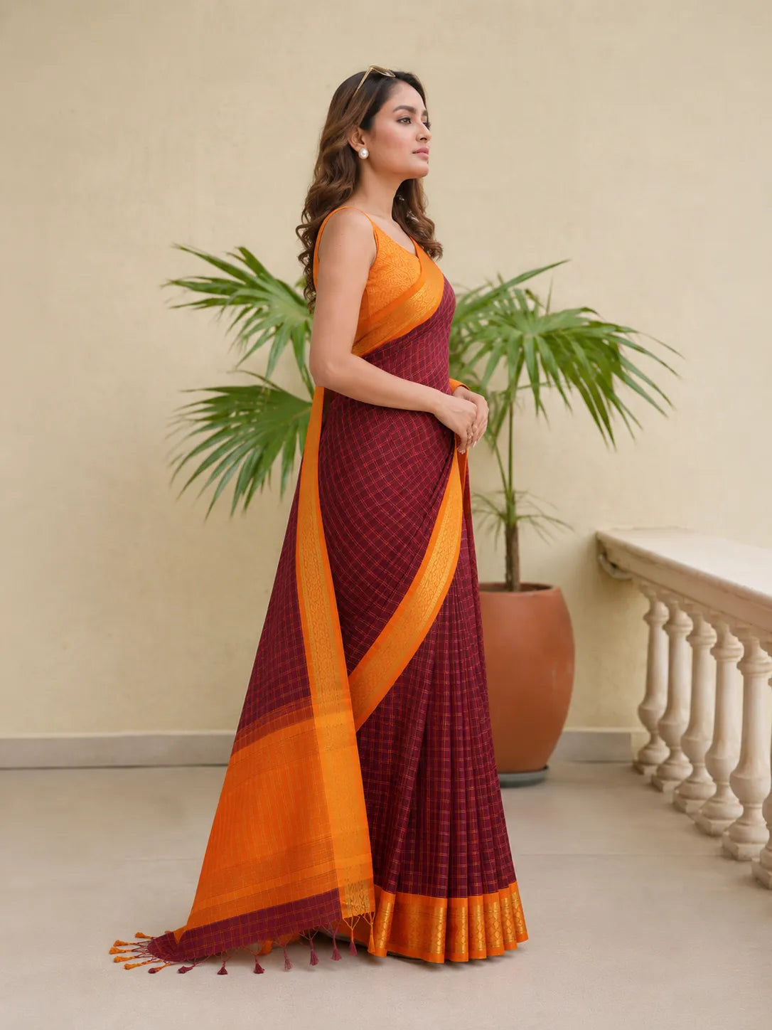 Nayantara Wine Purple Saree with Sunset Orange Heritage Border