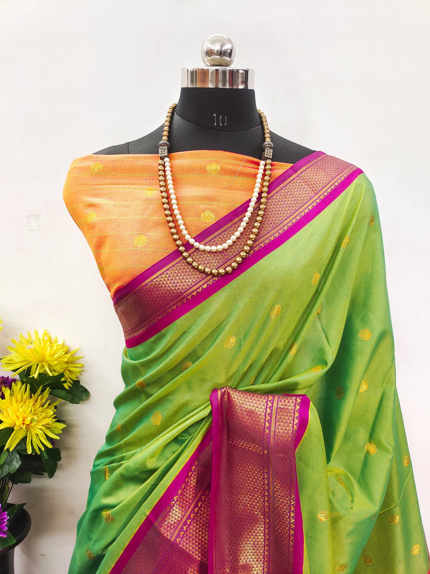 Parrot Green Cotton Silk Saree with Pink Zari Border & Contrast Orange Pallu