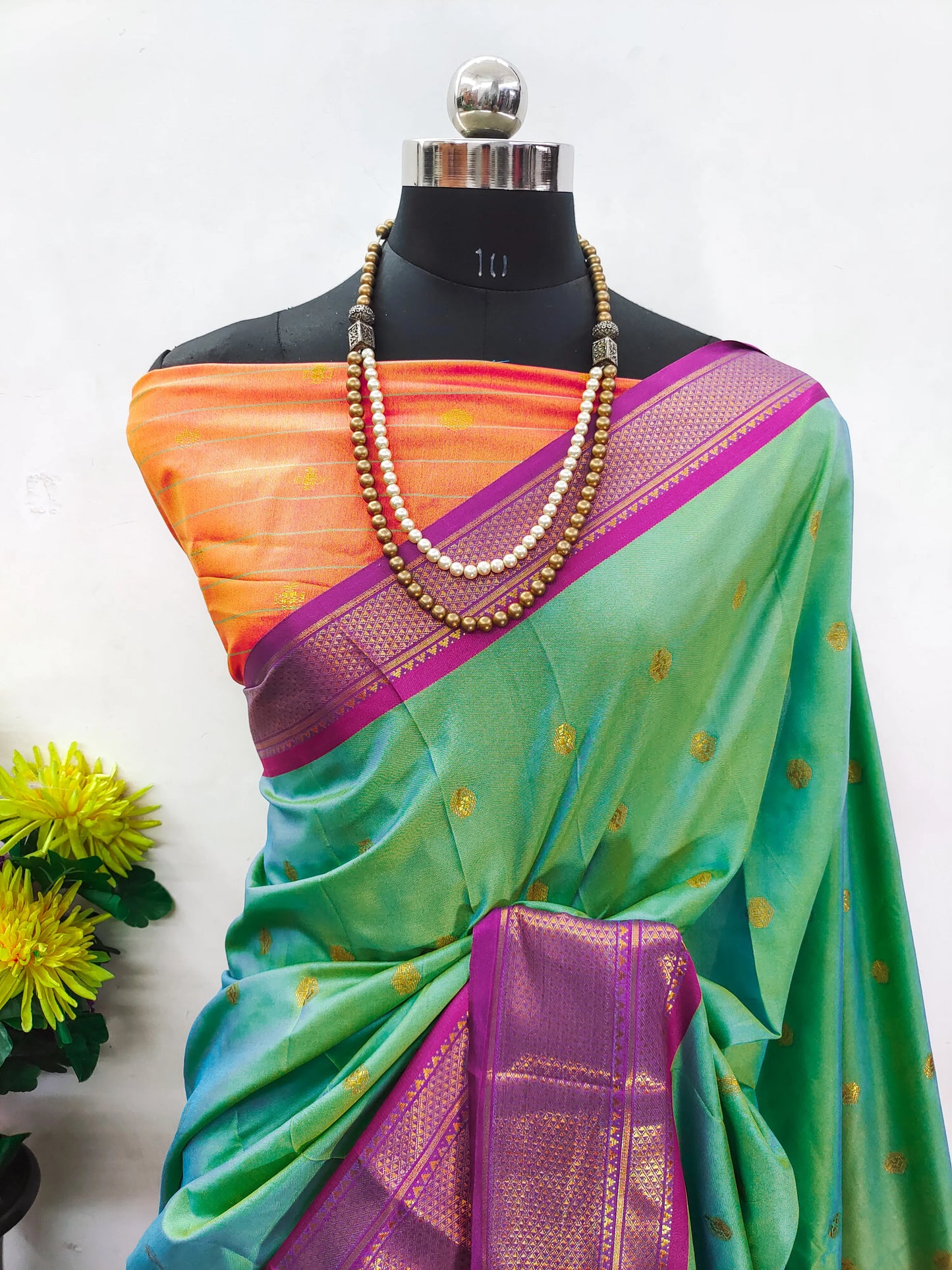 Mint Green Cotton Silk Saree with Gold Butti & Magenta Zari Border