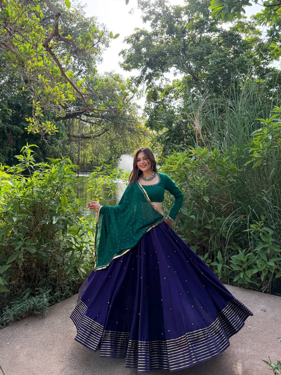 Navy Blue Roman Silk Navratri Lehenga Choli with Mirror Work & Ghughari Lace