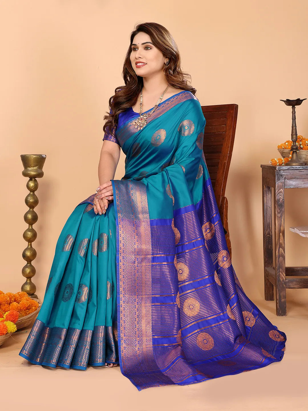 Firozi Blue Soft Silk Saree with Royal Blue Zari Border & Circular Floral Medallion Motifs