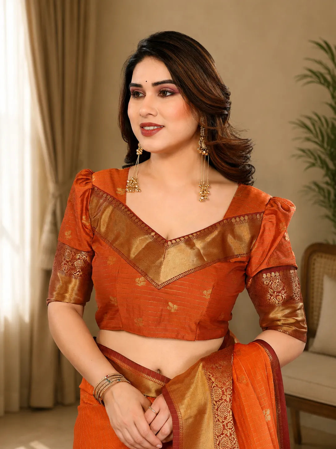 Radiant Sunset Orange Kanjivaram Silk Saree with Traditional Kattam Weave & Gold Zari Border