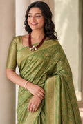Elegant Mehendi Green Banarasi Silk Saree with Floral Jaal Weaving & Rich Zari Pallu