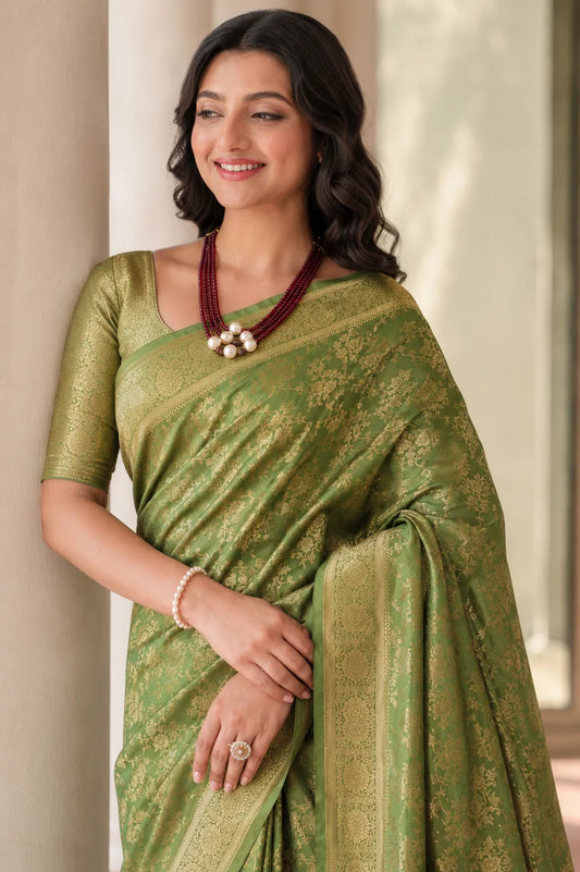 Elegant Mehendi Green Banarasi Silk Saree with Floral Jaal Weaving & Rich Zari Pallu