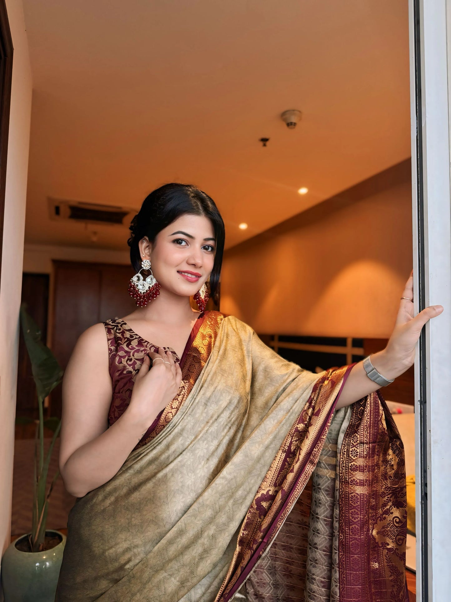 Chiku Gold Kanjivaram Silk Saree with Wine Zari Border & Peacock Motifs