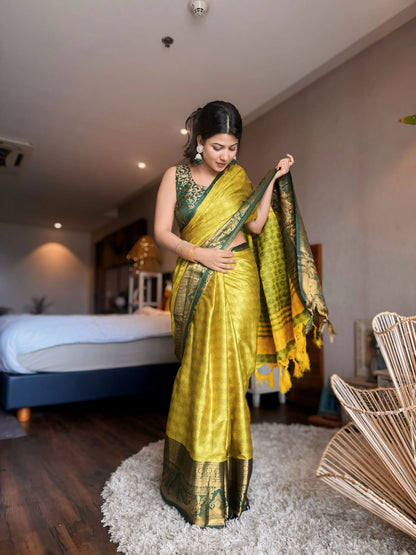 Lemon Yellow Kanjivaram Silk Saree with Bottle Green Peacock Border & Rich Zari Pallu