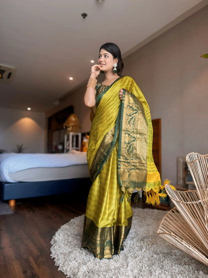 Lemon Yellow Kanjivaram Silk Saree with Bottle Green Peacock Border & Rich Zari Pallu
