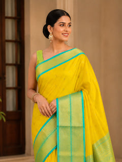Sunshine Yellow Cotton Silk Saree with Aqua Blue Zari Border & Contrast Mint Blouse