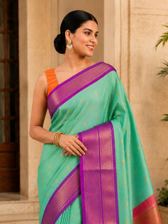 Mint Green Cotton Silk Saree with Gold Butti & Magenta Zari Border